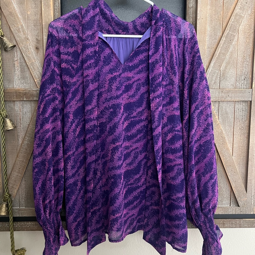 Adorable boutique top! Purple Animal Print Blouse.